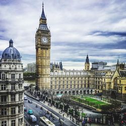 High angle view of clock tower in city