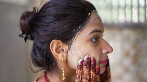 Close-up of girl eating at home