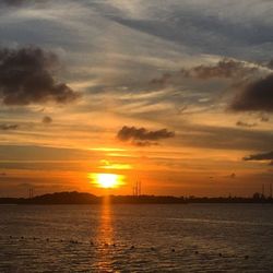 Scenic view of sunset over sea