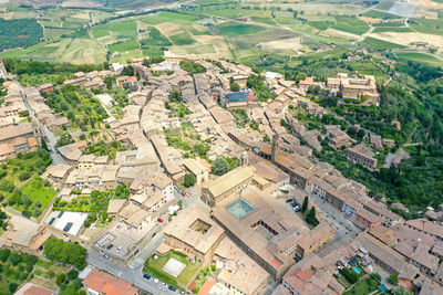 Aerial view of the medieval town of montalcino with the surrounding vineyards on the hills