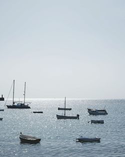 Boats sailing in sea