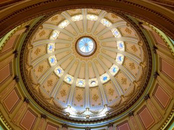 Low angle view of illuminated ceiling