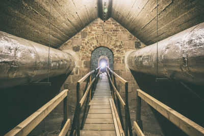 Man in illuminated corridor