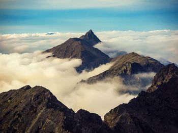 Panoramic view of snowcapped mountains against sky