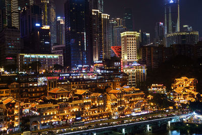 Illuminated buildings in city at night