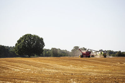 Combine harvester on field, sweden