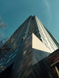 Low angle view of modern building against sky