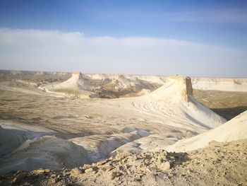 Scenic view of desert against sky