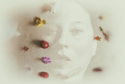 Close-up portrait of woman with flowers