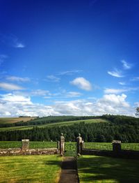 Green landscape against blue sky