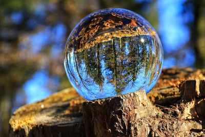 Close-up of crystal ball on metal