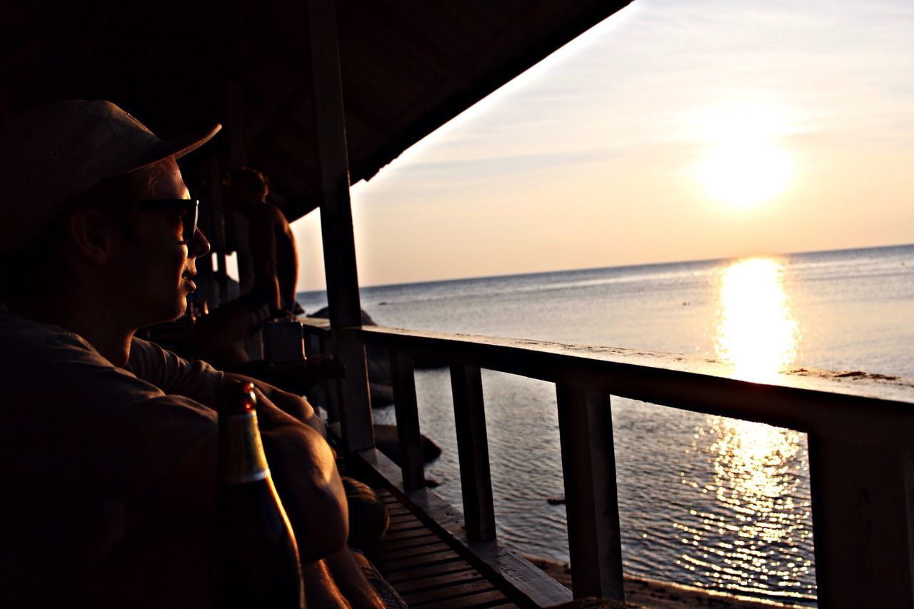 water, sunset, sun, sea, railing, sunlight, sunbeam, reflection, pier, scenics, sky, horizon over water, beauty in nature, tranquility, tranquil scene, nature, lens flare, built structure, idyllic