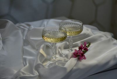 Close-up of white roses on table