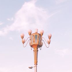 Low angle view of street light against sky