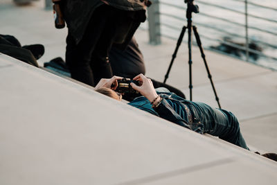 Man photographing on mobile phone