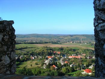 Scenic view of landscape against clear blue sky