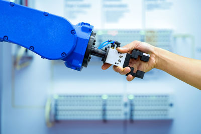 High angle view of man working on factory