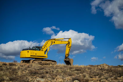 Construction site on field against sky