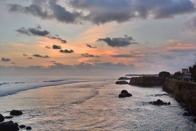 Scenic view of sea against sky at sunset