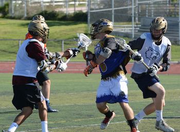 Full length of men playing on field