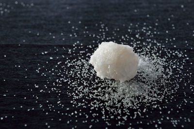 Close-up of ice on table