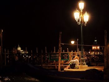 Illuminated street light at night