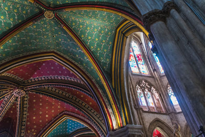 Low angle view of ornate window in building