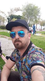 Portrait of young man wearing sunglasses