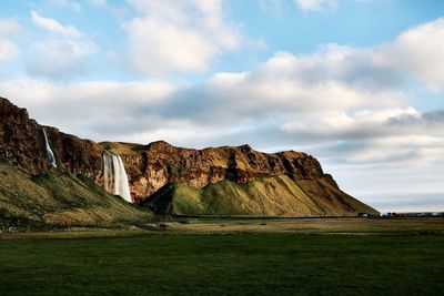 Scenic view of rock formations against sky