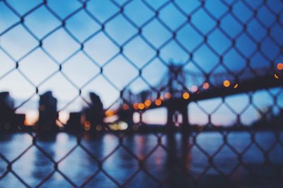 Chainlink fence seen through chainlink fence