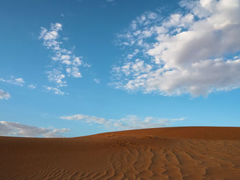 Scenic view of desert against sky