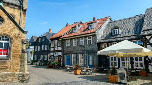 Buildings in city against sky