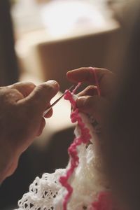 Close-up of hand knitting wool