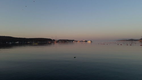 View of sea against clear sky during sunset