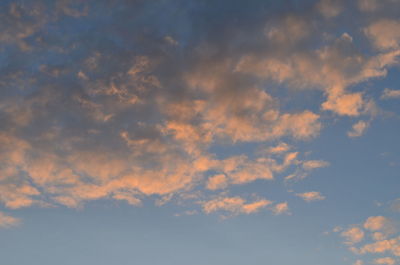 Low angle view of cloudy sky during sunset