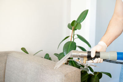 Cropped hand of scientist examining patient