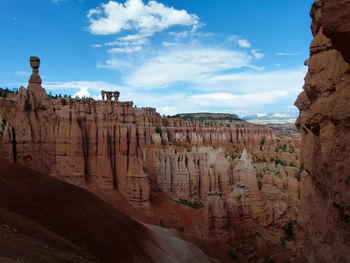 Scenic view of bryce canyons against sky