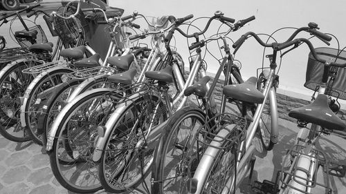 Close-up of bicycles in parking lot