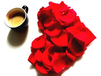 High angle view of coffee cup on white background