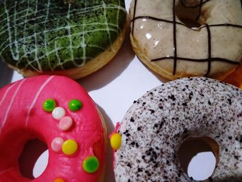 High angle view of multi colored candies on table