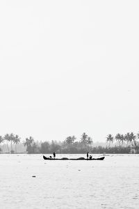 Scenic view of lake against clear sky