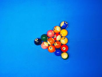 Directly above view of colorful balls on pool table