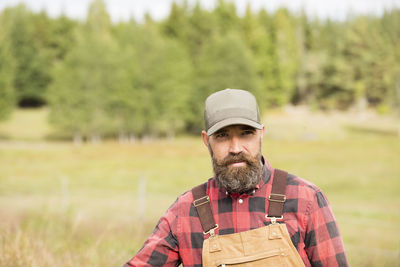 Male farmer standing in field