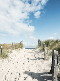 Scenic view of beach against sky