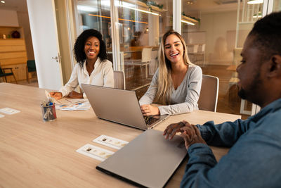 Business colleagues having discussion at office