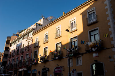 Low angle view of residential building against sky