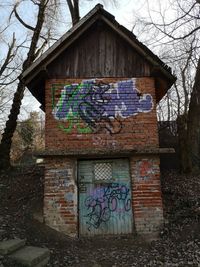 Graffiti on wall of abandoned building