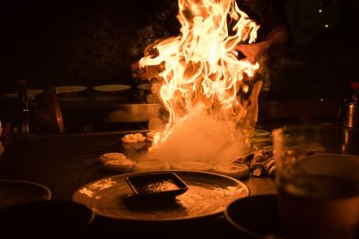 Flaming pan in commercial kitchen