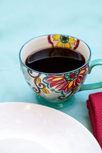 Close-up of coffee cup on table