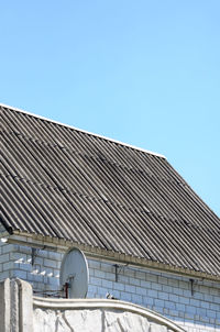 Low angle view of building against blue sky